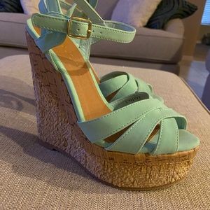 Baby blue wedges, size 7.5. Never worn!